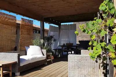 Image de Coeur du village bord de mer Maison Bois 80m² + 35m² Terrasse