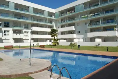 Image de Location saisonnière appartement moderne  avec parking et piscine à Roses
