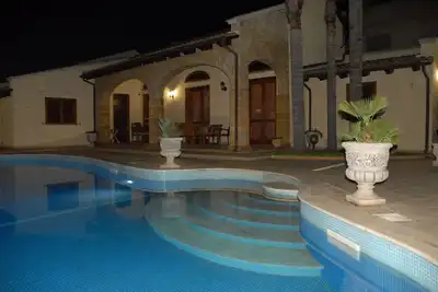 Image de Appartamentosignorile A Bordo Piscina In Villa Di Lusso Con Piscina Condivisa