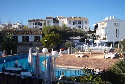Image de Bel appartement de deux chambres avec piscine partagée avec une vue magnifique