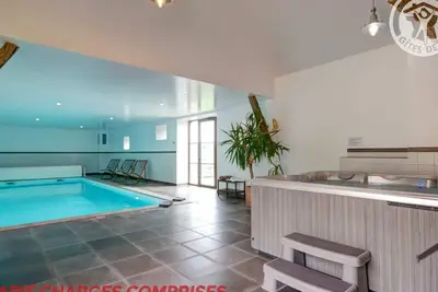 Image de Gîte spacieux en campagne avec jacuzzi, sauna et jeux extérieurs