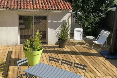 Image de Maison/Appartement avec Jardin