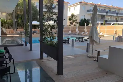 Image de Appt confortable dans un complexe de luxe avec 2 piscines communes