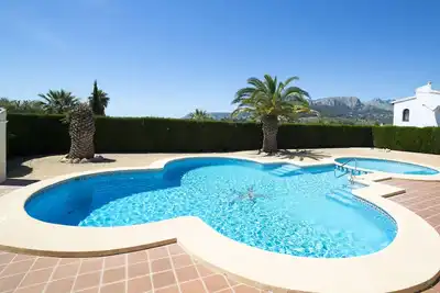 Image de Appartement dans une maison de vacances avec piscine, Wifi, climatisation, Tv, terrasse, parking