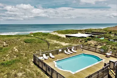 Image de Une plage Odyssea à Admirals View Iii Condo 2 chambres en bord de mer, accès à la piscine, à proximité de Kill Devil Hills