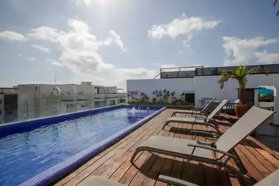 Image de Condo de luxe avec 2 piscines