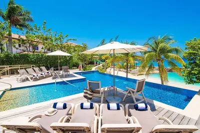 Image de Casa Luna Villa # 4: Complexe de luxe fermé près de Seven Mile Beach avec plage aux pieds nus, piscine et spa chauffé