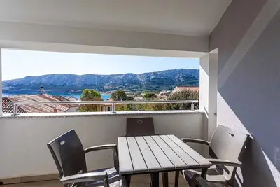 Image de Appartement de vacances avec climatisation et vue sur la mer