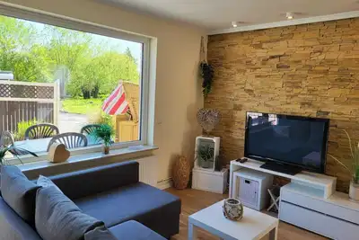 Image de Appartement à Travemünde avec un emplacement central, terrasse et chaise de plage