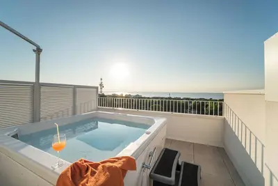 Image de Appartement de vacances avec climatisation et jacuzzi