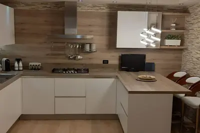 Image de Appartement romantique et confortable à quelques pas du centre, avec garage.