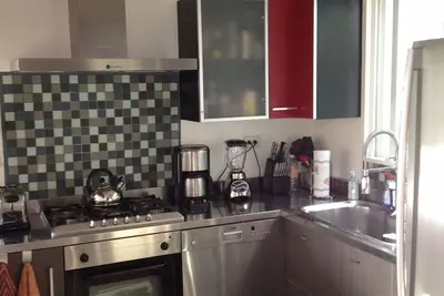 Image de Magnifique penthouse avec toit à un pâté de maisons de la 5e Avenue et de la plage de coco!