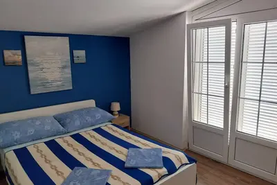 Image de Appartement de deux chambres avec la terrasse et la vue sur le mer Povljana, Pag (A-17222-a)