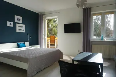 Image de 4 chambres, terrasse plein sud, 3 cuisines, 3 salles de bain, promenade à proximité