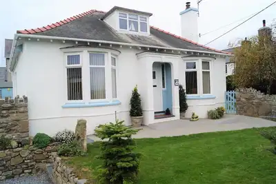 Image de Superbe et spacieux bungalow dormant, jardin clos, près de la plage de Nefyn avec parking