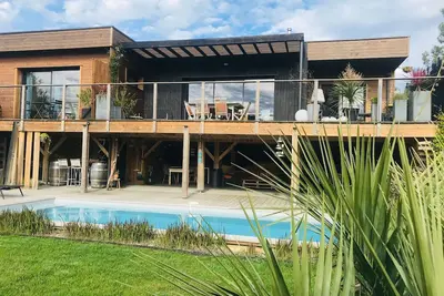 Image de Villa Regard sur le lac avec piscine privée et  vue sur le Lac de Lacanau