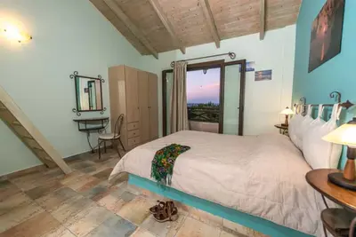 Image de Une chambre à coucher avec vue sur la mer de Dante