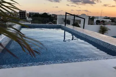Image de Condo Paradis Avec 2 Bdr Et Piscine À PROXIMITÉ De La Plage De Mamitas Et Du CINQUIÈME Avenue