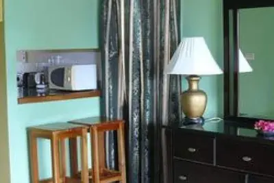 Image de Negril Beach Condo - Jamaïque - Studio, 2 lits doubles w / cuisine, Unité 1