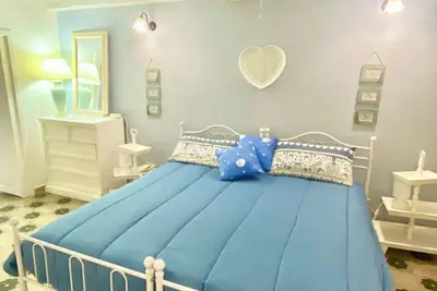 Image de A la maison \"Ortigia Dreaming\" Suite sur deux niveaux avec 7 lits confortables.