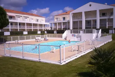Image de Appt en rez de jardin avec piscine, proche plage