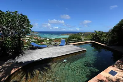 Image de Vues sur le lagon et l'océan, piscine, hamac et douche extérieure, Wifi gratuit