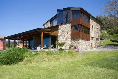 Image de Zone Beach House avec jardin et véranda