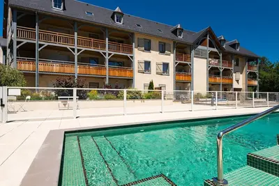 Image de Appartement cosy à 500 m de la télécabine et des thermes! Casiers à ski