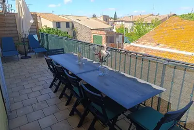 Image de Appartement de maison de ville souhaitable au 2ème étage, pour 4 personnes. Terrasse sur le toit et parking.