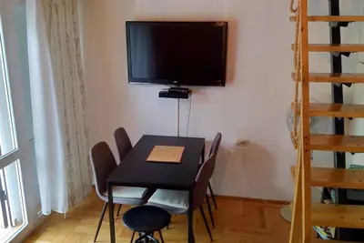 Image de Appartement pour 5 personnes avec climatisation, Wifi gratuit à côté de la plage libre