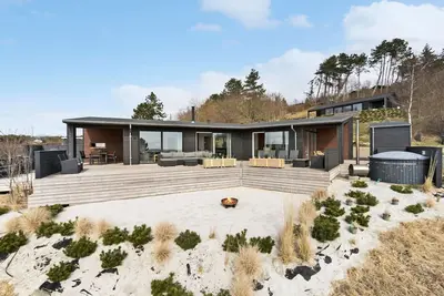 Image de Belle maison à Knebel avec sauna