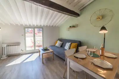 Image de Appartement terrasse - Centre historique - places aux aires