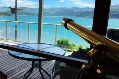 Image de Piwakawaka Retreat - un chalet chaleureux et tranquille sur le front de mer à Wainui