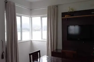 Image de Bel appartement, vue sur la mer à Ponta da Praia avec Accès Internet