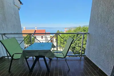 Image de Appartement de vacances avec balcon et vue sur la mer