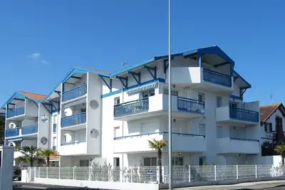 Image de Résidence Le Magellan. Appartement en rez-de-chaussée pour 4 personnes proche au port de pêche.