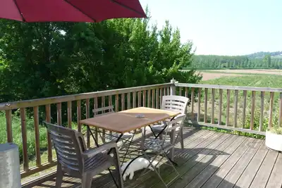 Image de Grand studio de 70 m2 avec mezzanine. Terrasse de 38 m2, vue sur campagne.