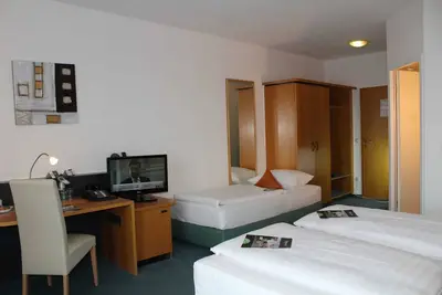 Image de Chambre double confort avec lit supplémentaire - H + Hotel Erfurt