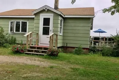 Image de Location de maison privée à la semaine avec accès au sentier de Vtt