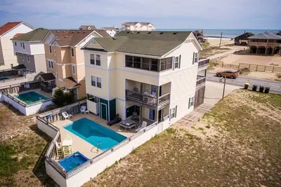 Image de Sandy Toes | 50 m de la plage | Chiens bienvenus, piscine privée, bain à remous