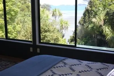 Image de Matakana Beach N Bush Hideaway Bord De L'Eau, Apporter Le Chien Disponible Xmas / Nouvel An