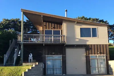 Image de Superbe maison de plage familiale avec vue sur l'océan.