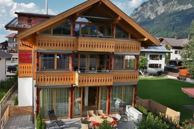 Image de Situation centrale et tranquille, confort 5 étoiles, balcon orienté au sud, été: chemin de fer de montagne incl.