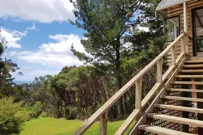 Image de Kereru Cottage - bach privé avec vue sur la mer