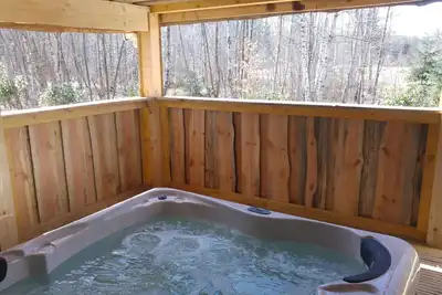 Image de Cottage-Chalet cosy avec Jacuzzi et Etang Privatif, en pleine nature!