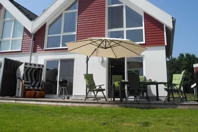 Image de Maison de vacances à l'atmosphère chaleureuse dans le Seepark Nordhorn: mobilier de haute qualité