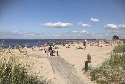 Image de À côté des piscines extérieures de Malen et de la mer, habitent une maison en rangée à Båstad