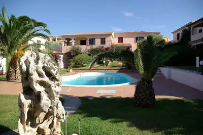 Image de San Teodoro appartement dans résidence avec piscine