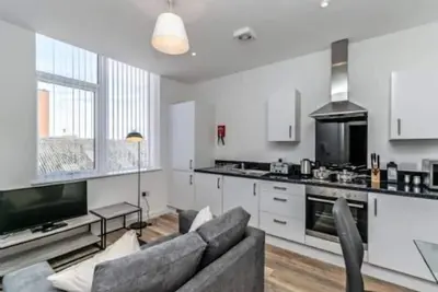 Image de City Suites - 1 lit - un chester pouvant accueillir 2 personnes dans 1 chambre