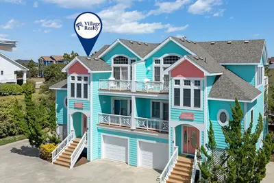 Image de Love R Shack: Duplex de 5 chambres, côté mer avec bain à remous et piscine communautaire, proche de la plage.